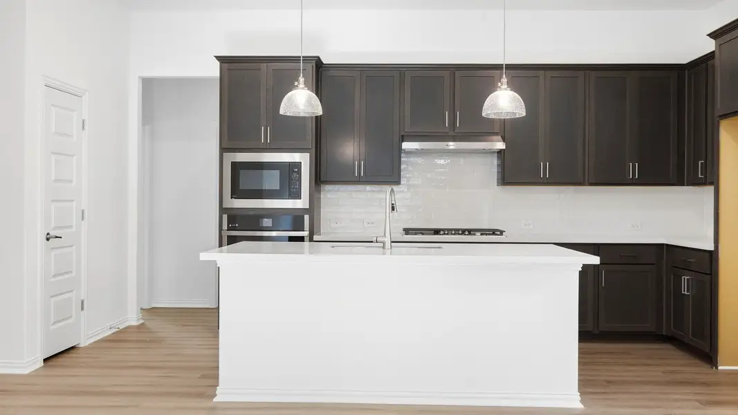Furnished interior view inside a new home in Sunfield, Buda (Image 29).