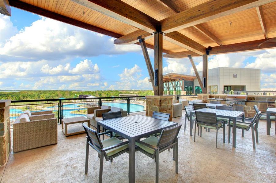 View of patio featuring a grill