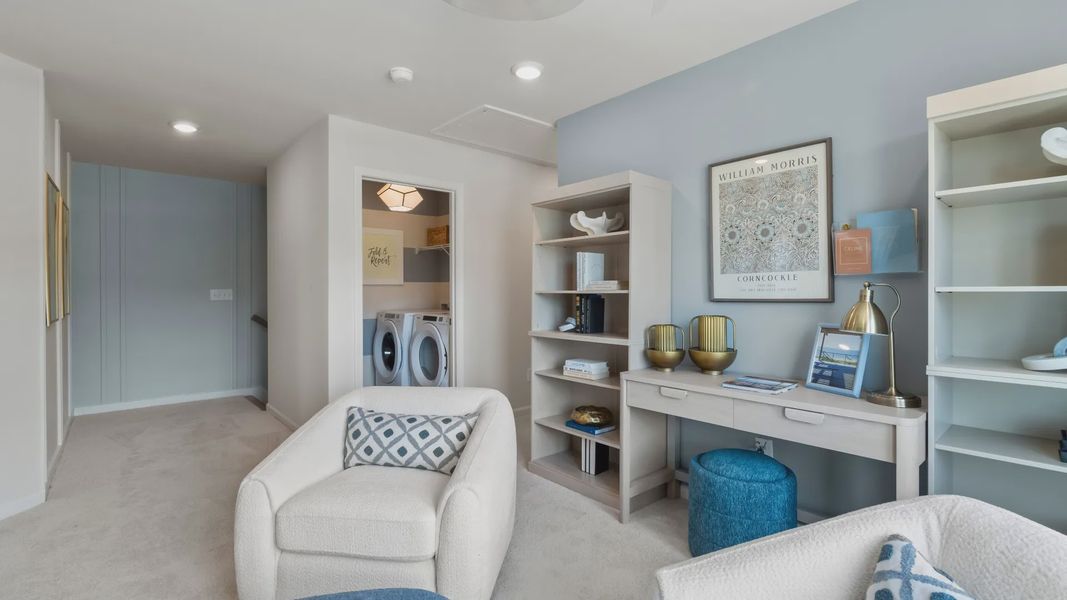 Spacious upstairs loft in new construction townhome for flexible office or lounge use with natural daylight. Spacious upstairs loft in new construction townhome for flexible office or lounge use with natural daylight.