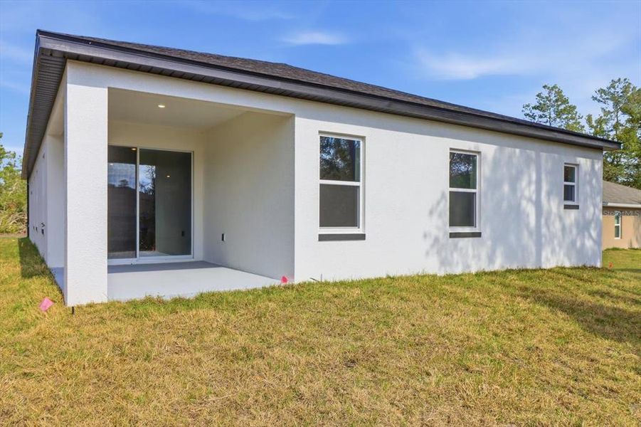 Exterior details and patio area of a home in , Ocala (Image 3).