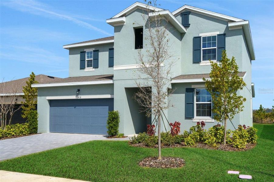 Front exterior of a new home in Turnleaf, Punta Gorda, FL, highlighting curb appeal (Image 1). Front exterior of a new home in Turnleaf, Punta Gorda, FL, highlighting curb appeal (Image 1).