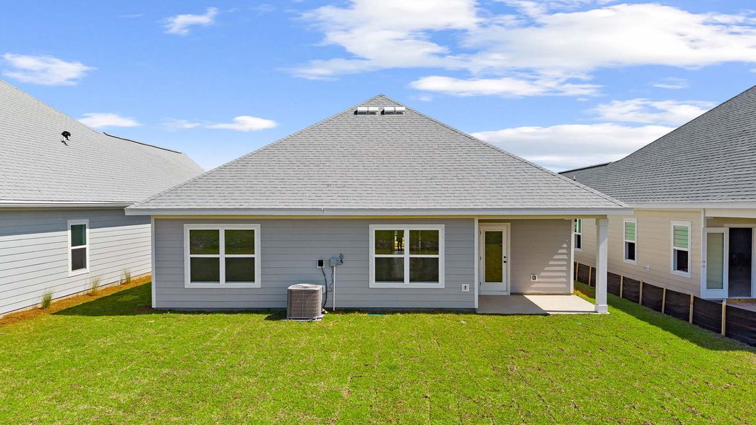 Exterior details and patio area of a home in Caballeros Estates At Hombre, Panama City Beach (Image 3).