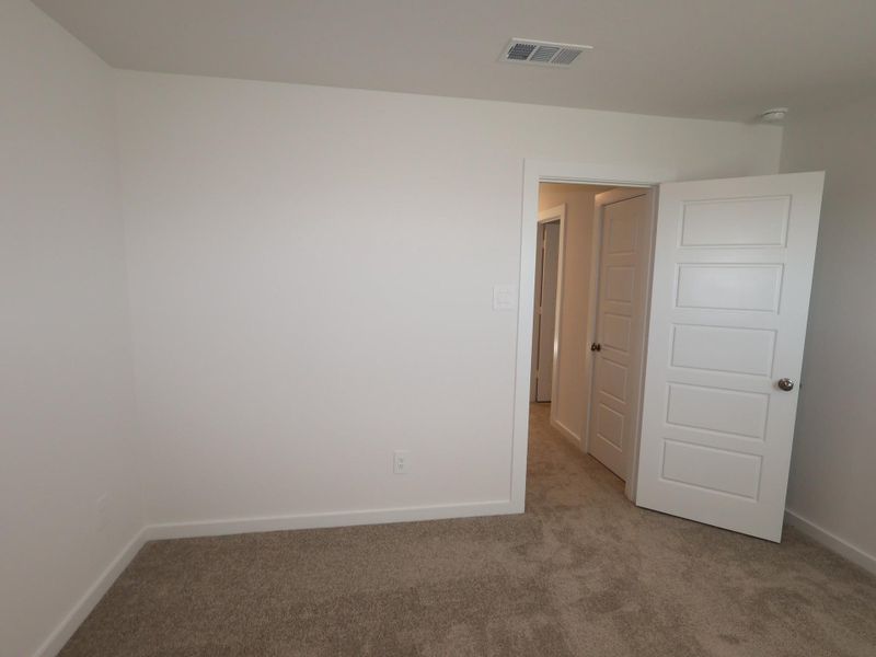 Spacious, unfurnished interior of a new home in Pinewood at Grand Texas, New Caney (Image 15). Spacious, unfurnished interior of a new home in Pinewood at Grand Texas, New Caney (Image 15).