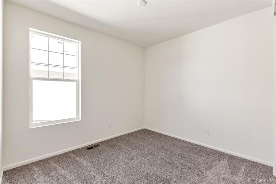 Spacious, unfurnished interior of a new home in Terrain Oak Valley, Castle Rock (Image 23).