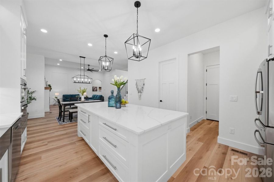 Bright, open, and beautifully designed, this kitchen is truly the heart of the home
