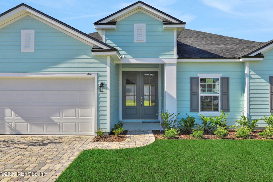 Exterior details and patio area of a home in Silver Landing at SilverLeaf, St. Augustine (Image 22).