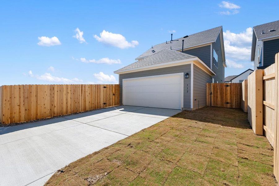 Exterior details and patio area of a home in Lariat, Liberty Hill (Image 28).