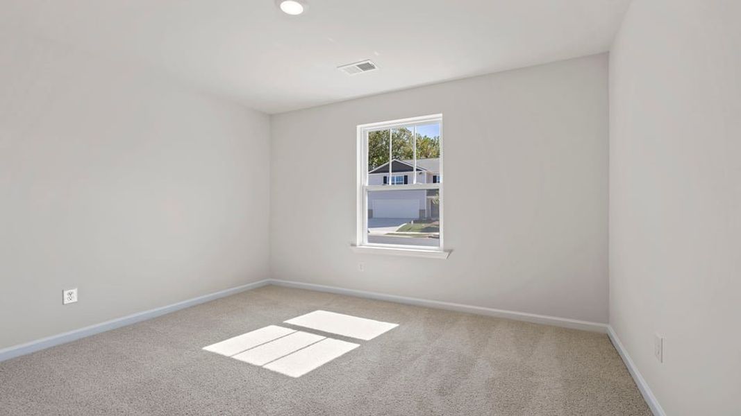 Spacious, unfurnished interior of a new home in Village Grove, Greenville (Image 12).