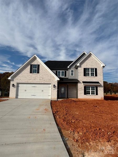 Front exterior of a new home in , Lexington, NC, highlighting curb appeal (Image 5).