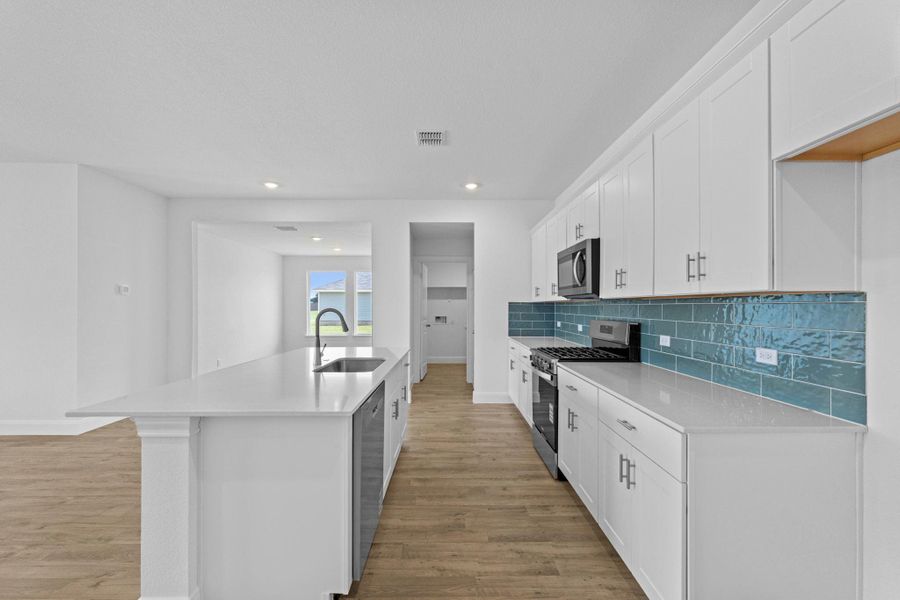Furnished interior view inside a new home in Railhead, Cedar Creek (Image 13).