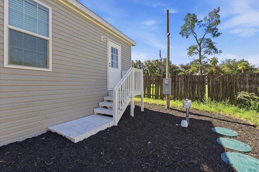 Exterior details and patio area of a home in , Zephyrhills (Image 25).