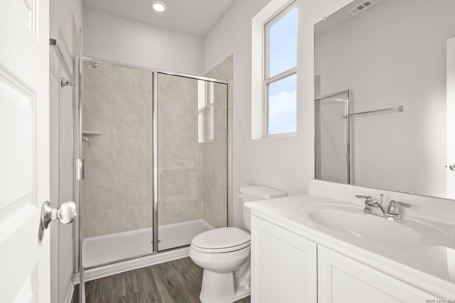 Furnished interior view inside a new home in Blue Ridge Ranch, San Antonio (Image 9).