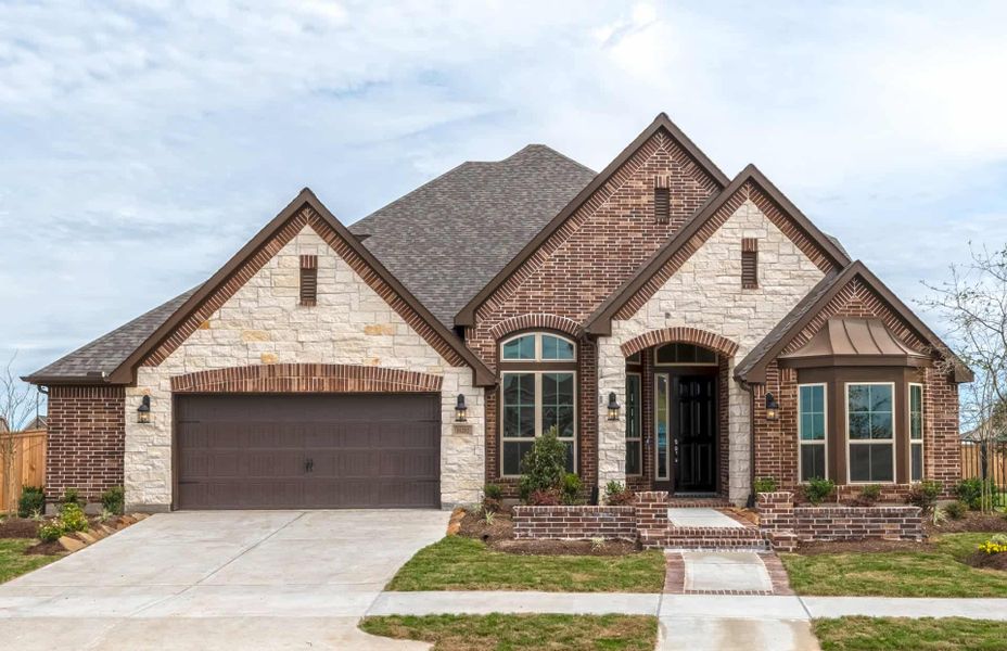 Representative exterior photo of a completed home built from the 3326 by Ravenna Homes in Cross Creek West, Fulshear, TX (Image 28).