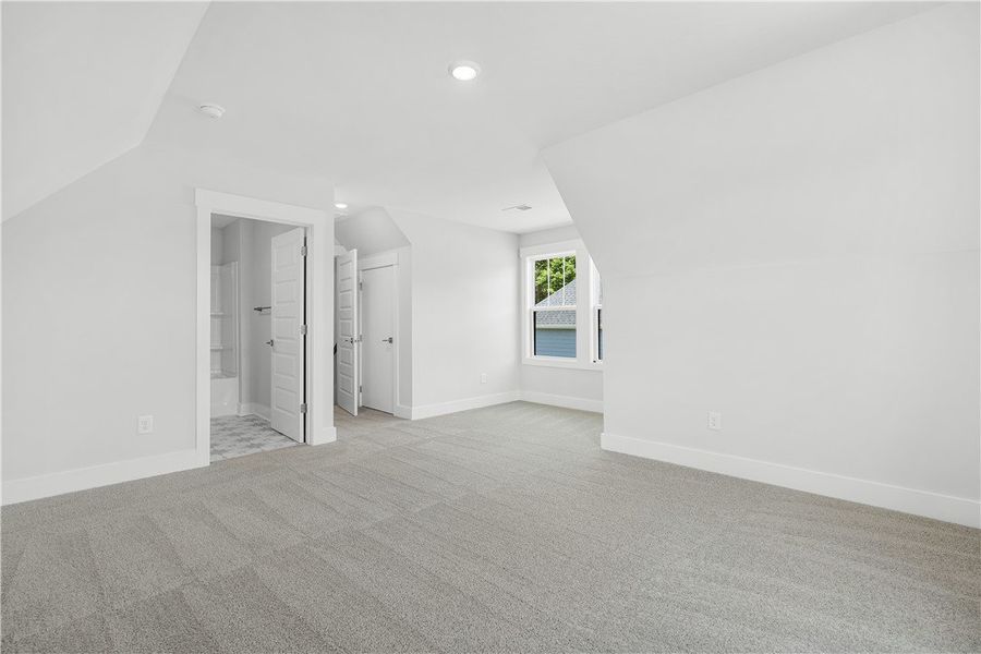 A spacious, naturally illuminated room featuring p A spacious, naturally illuminated room featuring p