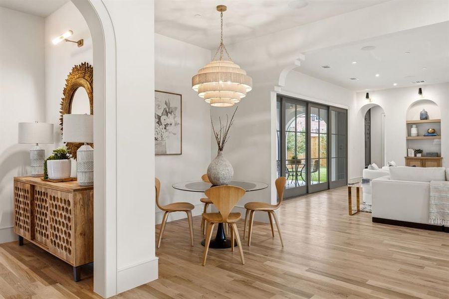 Expansive wood-finish flooring throughout Expansive wood-finish flooring throughout