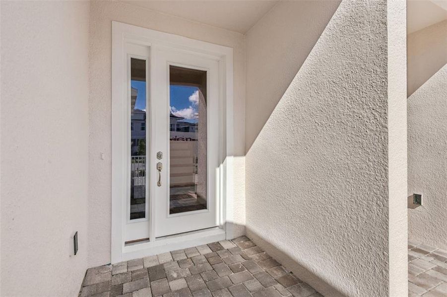 Exterior details and patio area of a home in Lagoon Residences at Epperson, Wesley Chapel (Image 3).