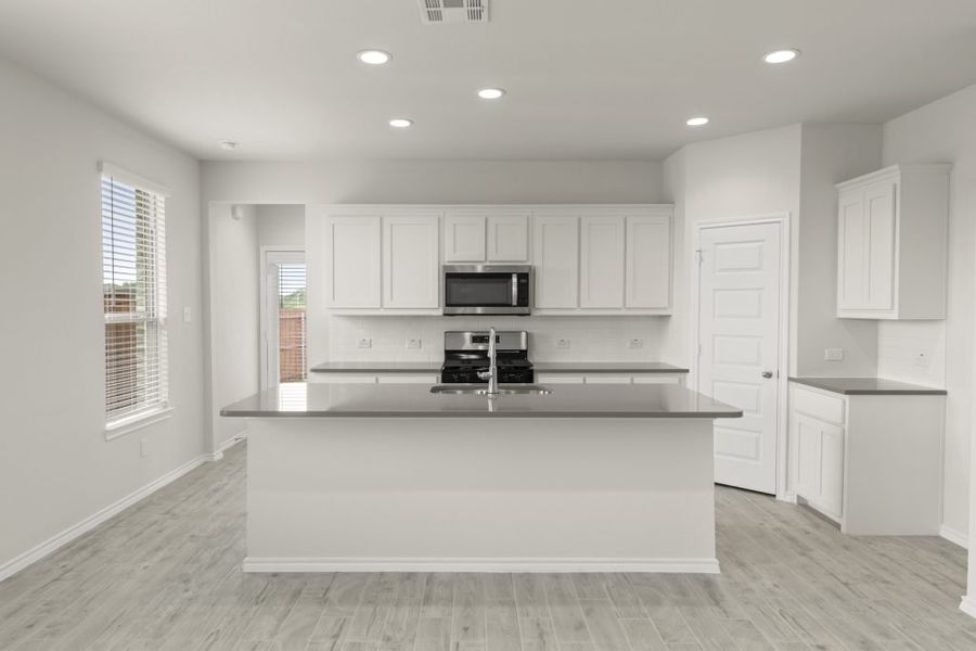 Representative exterior photo of a completed home built from the Cottonwood by Impression Homes in Northspur, Terrell, TX (Image 4).