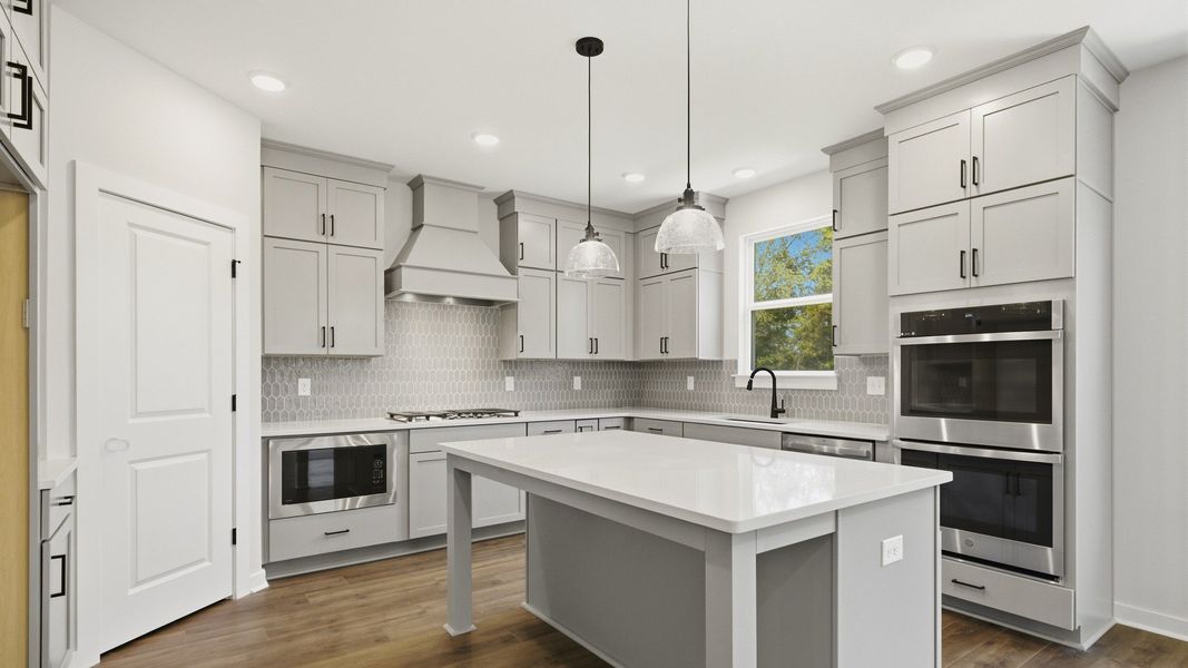 Ceiling height cabinet upgrade, quartz countertops, and ceramic tile backsplash Ceiling height cabinet upgrade, quartz countertops, and ceramic tile backsplash