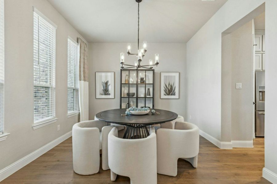 Representative furnished interior of a home built from the Reid by Kindred Homes in Heritage, McLendon-Chisholm (Image 7).
