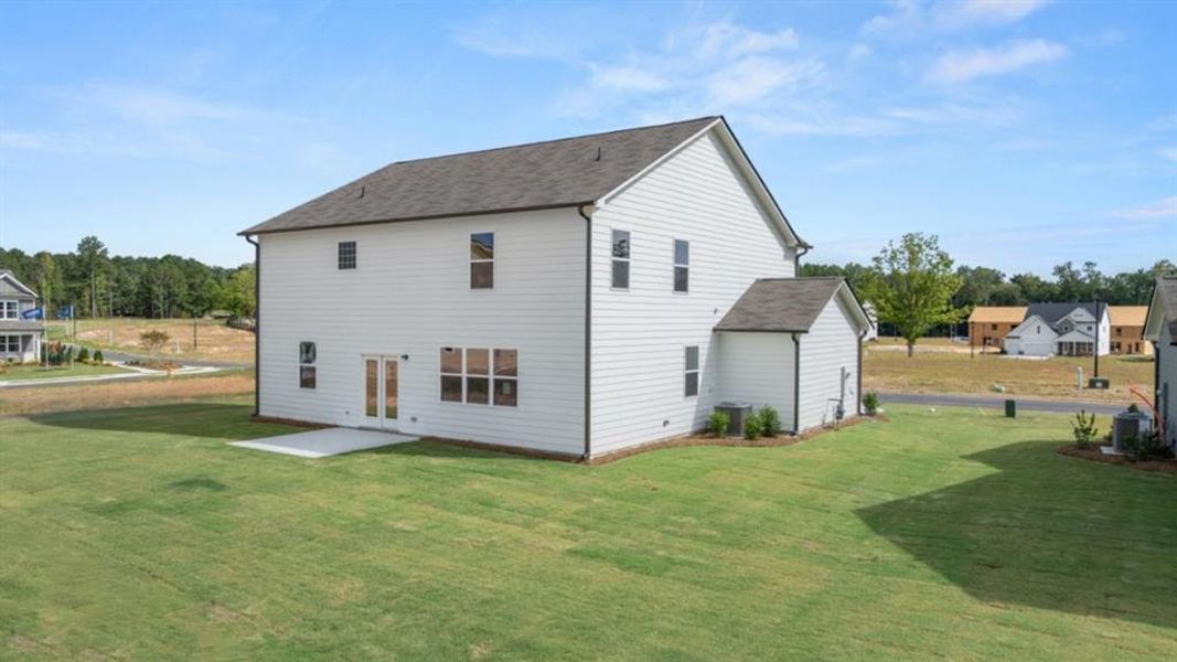 Front exterior of a new home in Fairway 17 at Mirror Lake, Villa Rica, GA, highlighting curb appeal (Image 21).