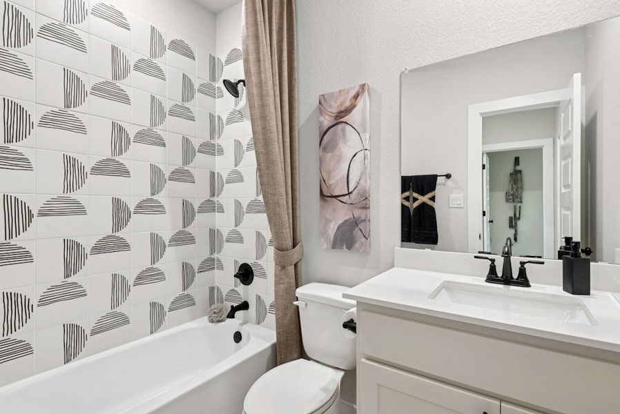 Representative furnished interior of a home built from the Upton by Scott Felder Homes in Flora, Hutto (Image 16).