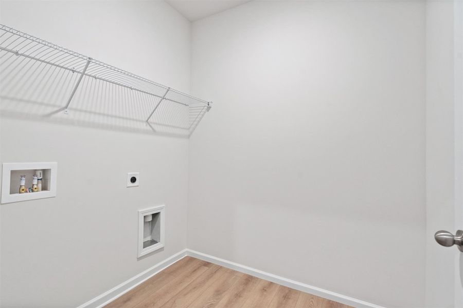 The Dove- Utility Room. Home under construction, photo used for illustrative purposes only, colors and options will vary.