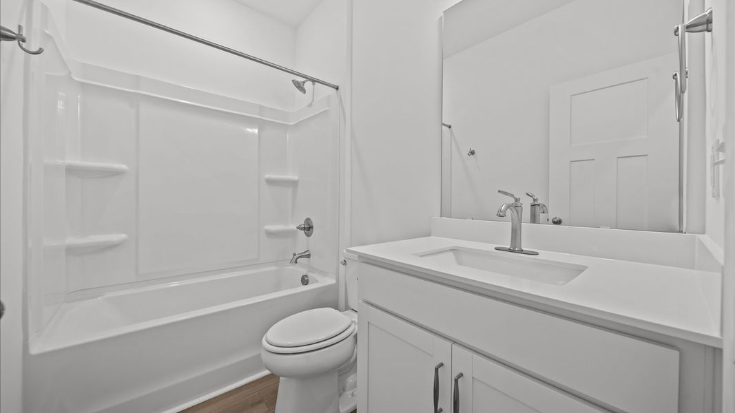 Stylish guest bathroom with superior design and thoughtful storage solutions