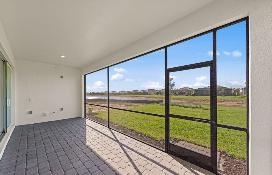 Exterior details and patio area of a home in TerraWalk at Babcock Ranch, Alva (Image 2). Exterior details and patio area of a home in TerraWalk at Babcock Ranch, Alva (Image 2).