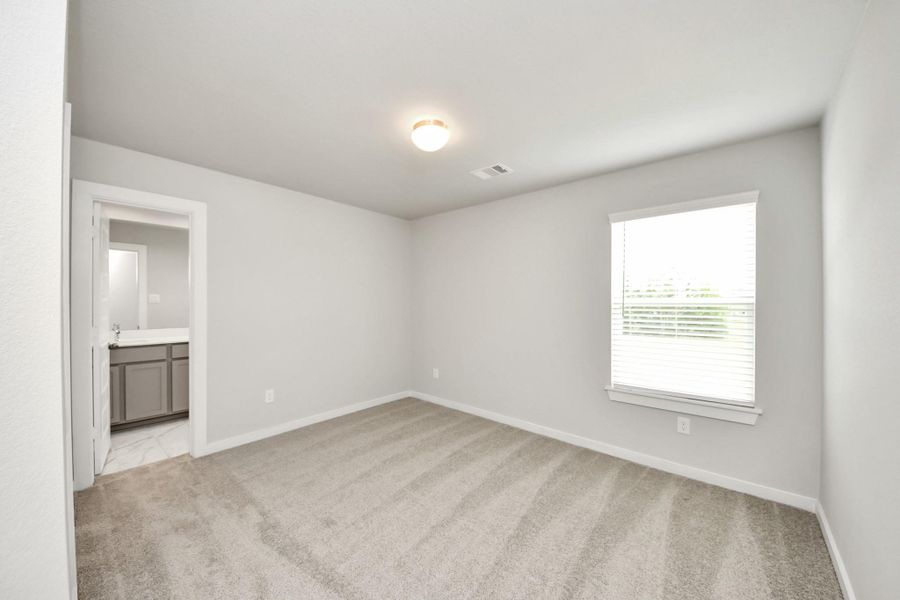 Generously sized secondary bedrooms featuring spacious closets, soft and inviting carpeting underfoot, large windows allowing plenty of natural light, and the added touch of privacy blinds for your personal retreat. Sample photo of completed home with similar floor plan. Actual colors and selections may vary. Generously sized secondary bedrooms featuring spacious closets, soft and inviting carpeting underfoot, large windows allowing plenty of natural light, and the added touch of privacy blinds for your personal retreat. Sample photo of completed home with similar floor plan. Actual colors and selections may vary.