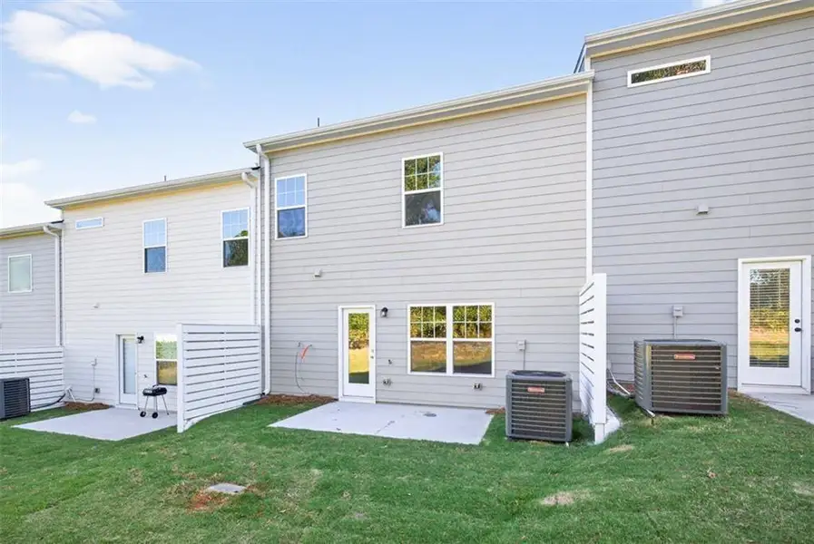Exterior details and patio area of a home in Jameson Towns, Villa Rica (Image 2).