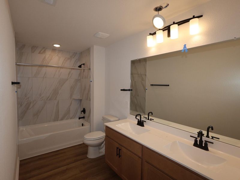 Furnished interior view inside a new home in Sorella, Tomball (Image 4).