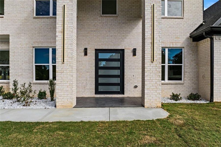 Exterior details and patio area of a home in , Loganville (Image 40).