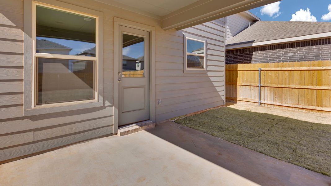 Exterior details and patio area of a home in Overlook West, Wolfforth (Image 3).
