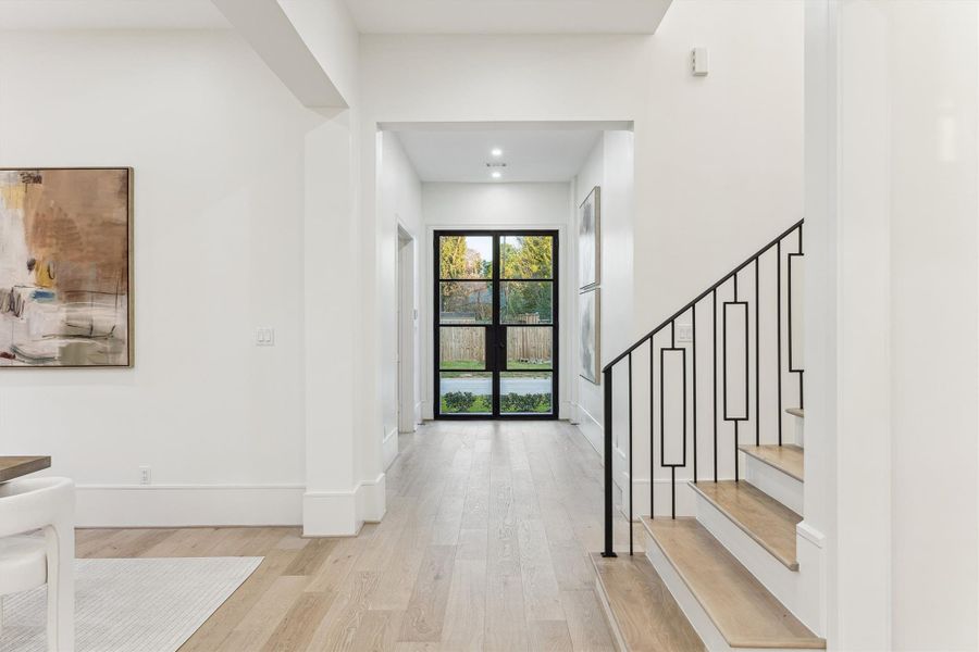 Formal entryway with stunning architectural lines.