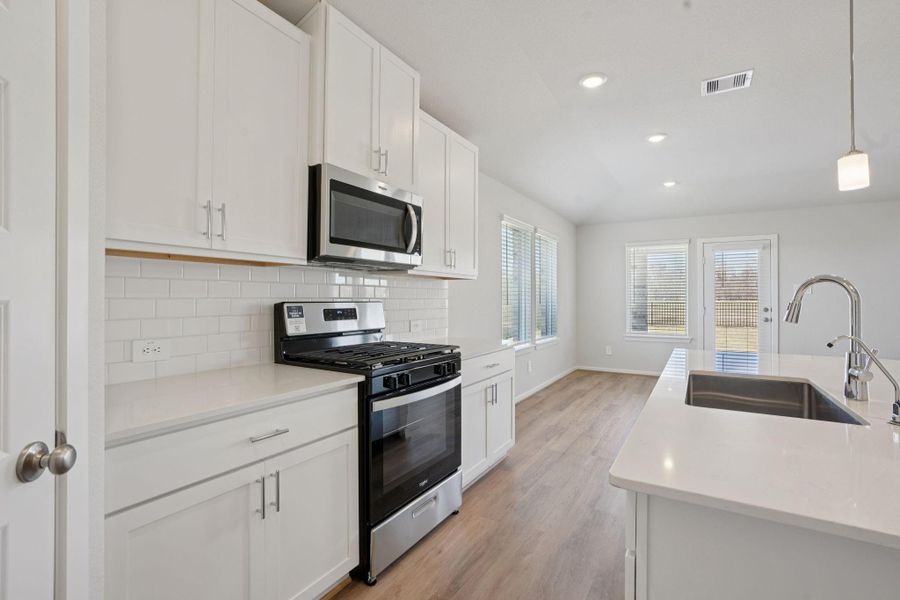 Furnished interior view inside a new home in Pine Lake Cove - Classic Series, Montgomery (Image 4).