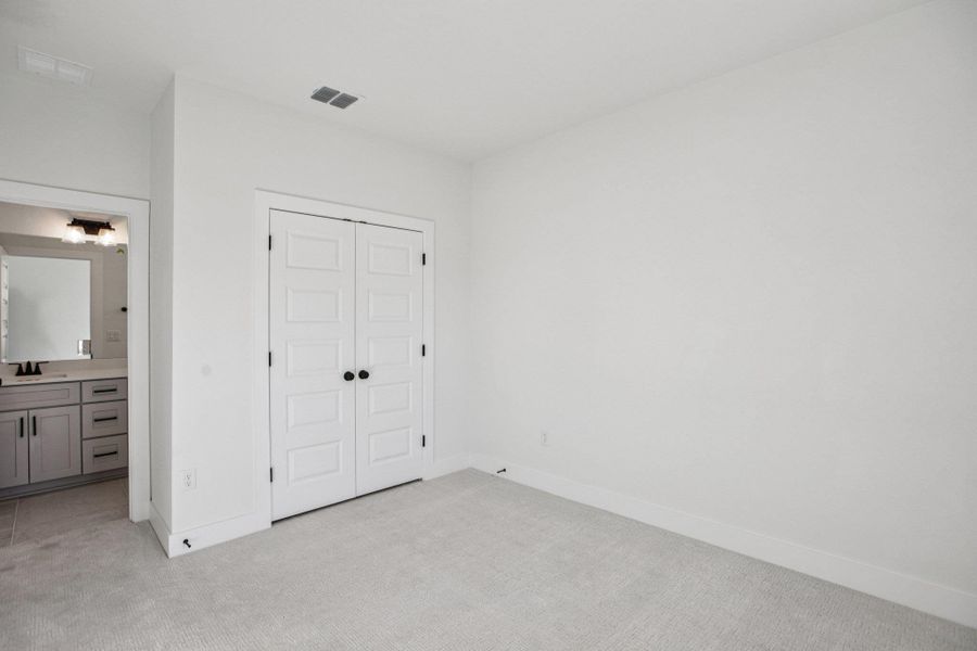 Spacious, unfurnished interior of a new home in Koenig Townhomes, Austin (Image 19).