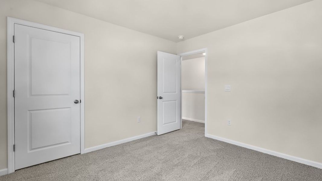 Spacious, unfurnished interior of a new home in Anderson Farm, Wendell (Image 29).