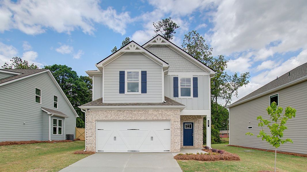 Representative exterior photo of a completed home built from the Reagan by DRB Homes in Enclave at Evergreen, Fairburn, GA (Image 22).