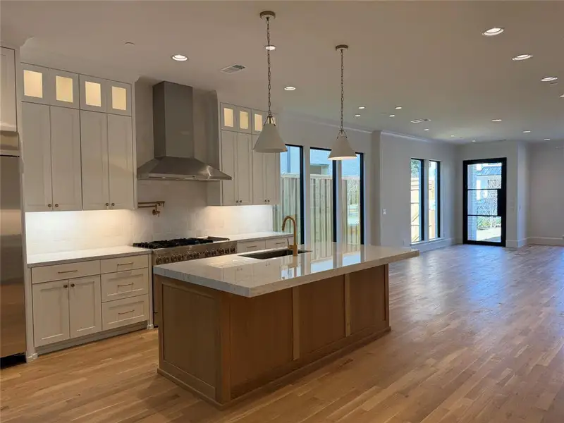 Island Kitchen open to the Living & Dining Areas