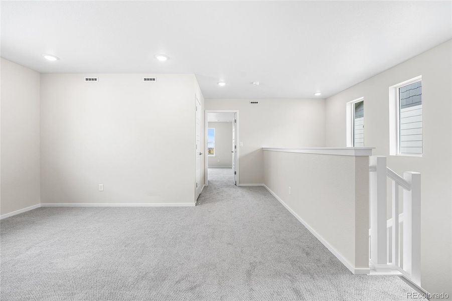 Spacious, unfurnished interior of a new home in Barefoot Village, Firestone (Image 24).