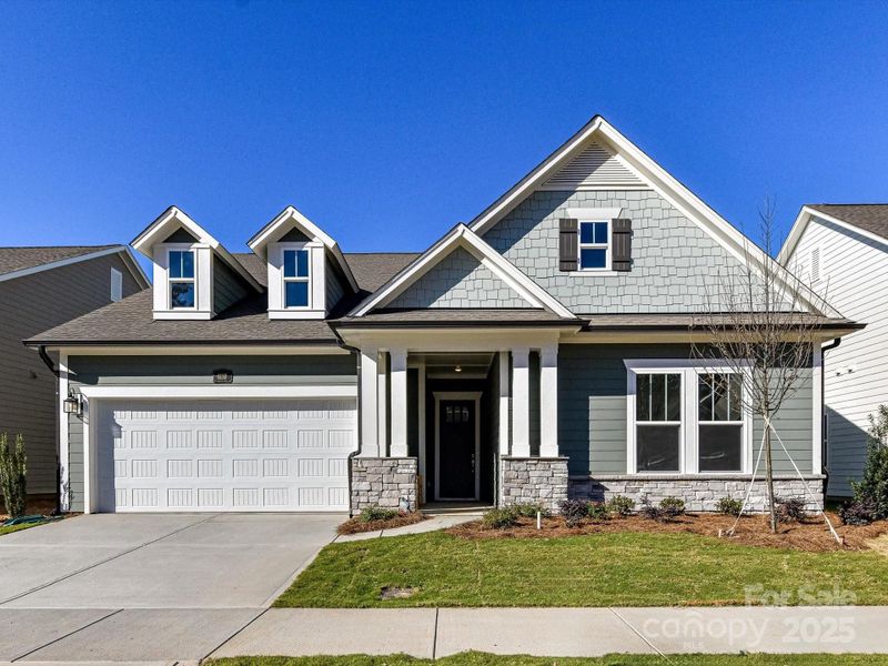 Front exterior of a new home in Encore at Streamside - Tradition Series, Waxhaw, NC, highlighting curb appeal (Image 25).