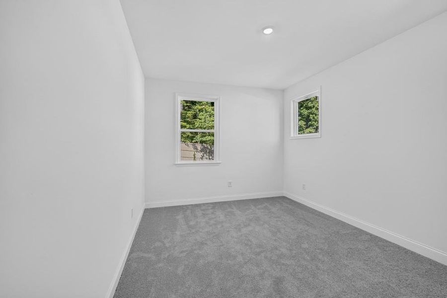 Spacious, unfurnished interior of a new home in Nichols Farm, Dacula (Image 24).