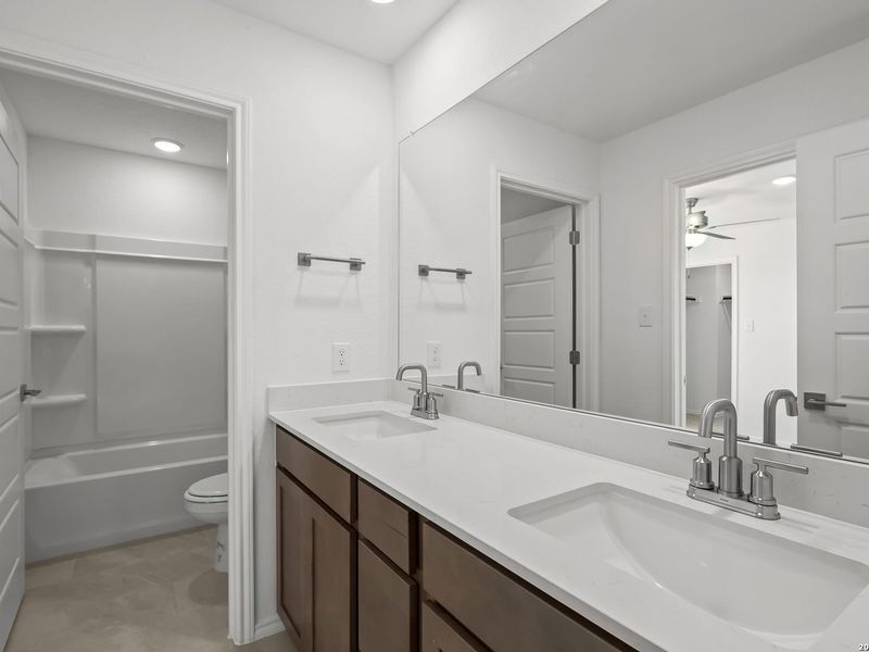 Furnished interior view inside a new home in Comanche Ridge, San Antonio (Image 17).
