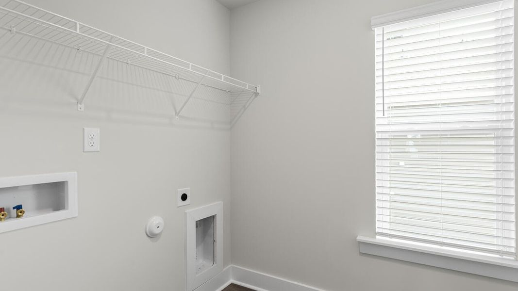 Representative unfurnished interior of a home built from the TILLMAN by D.R. Horton in The Preserve at Tidewater, Sneads Ferry (Image 44).