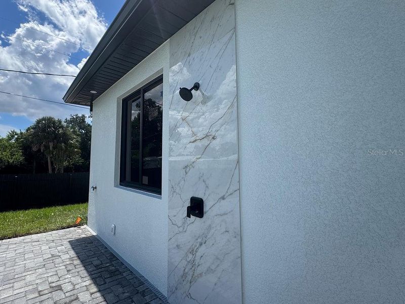 Front exterior of a new home in , Port Charlotte, FL, highlighting curb appeal (Image 24).