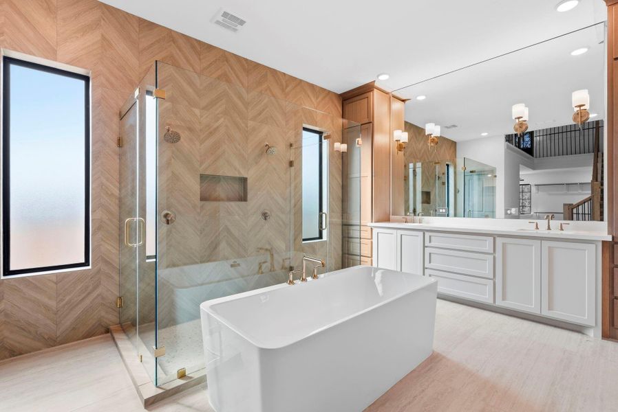 View of spa like primary bathroom upon entering.
