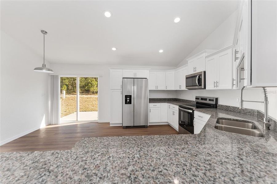 Granite Countertops, White Shaker Soft close cabinets