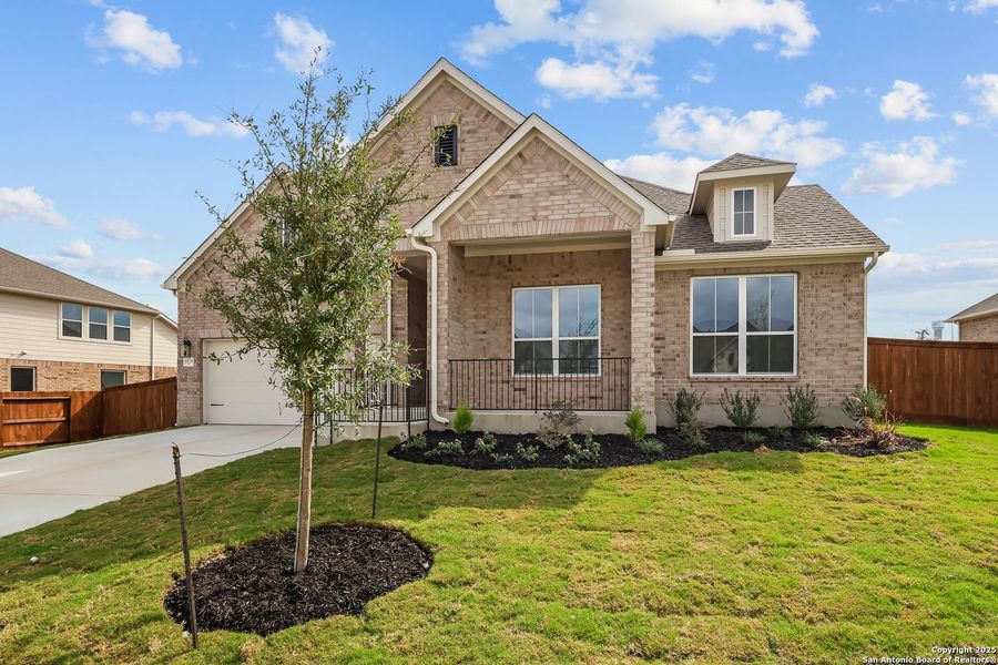 Front exterior of a new home in Homestead, Schertz, TX, highlighting curb appeal (Image 2).