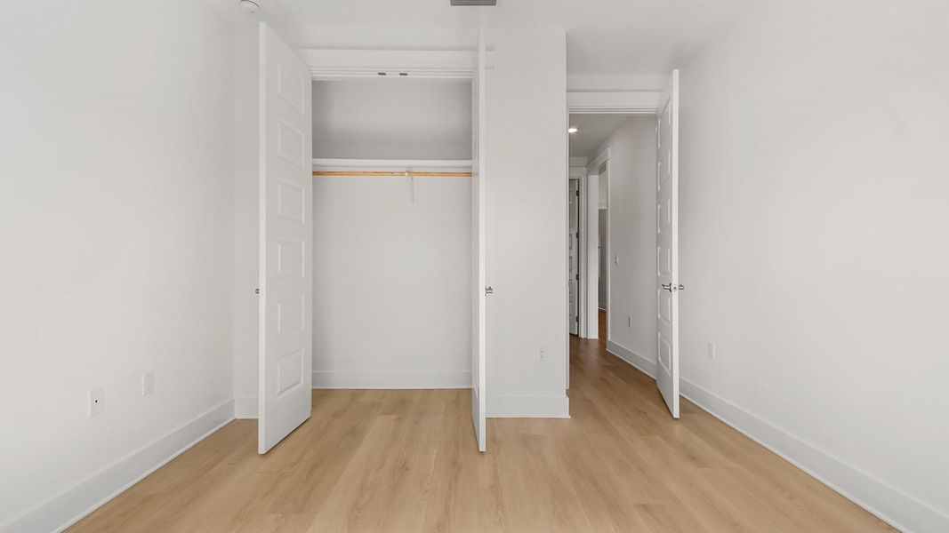 Representative unfurnished interior of a home built from the Pier by D.R. Horton in Breakfast Point East Phase II, Panama City Beach (Image 31).