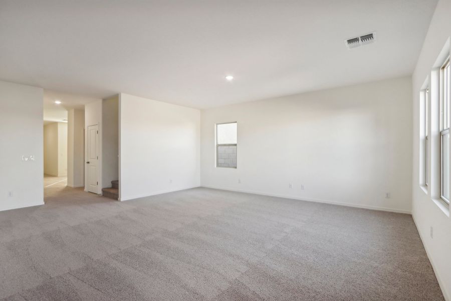 Representative unfurnished interior of a home built from the Eclipse by Starlight Homes in Stonebridge Manor, Waddell (Image 19).